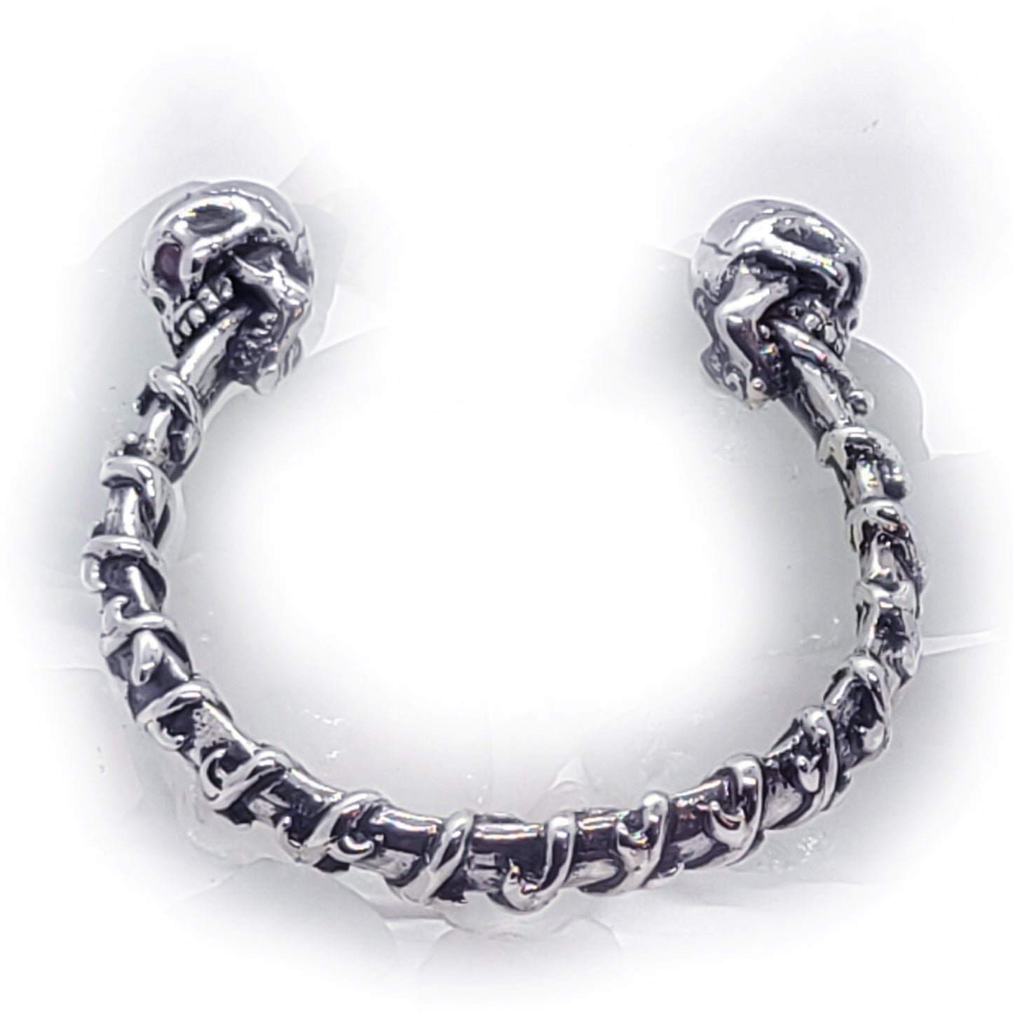 Dual Skull Silver Bracelet with Rubies