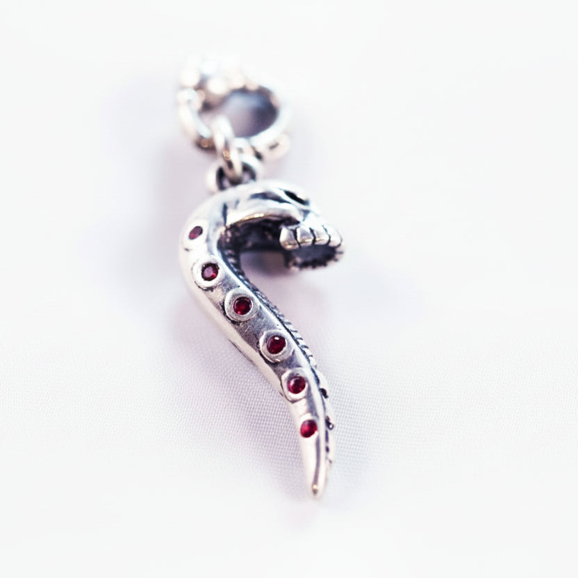 Fak Sterling Silver Pendant with Red Stones