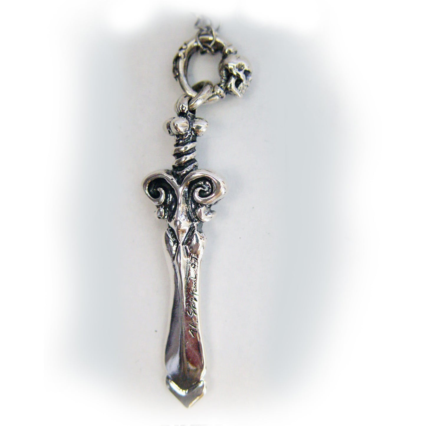 Skull Face Dagger Silver Pendant with Ruby