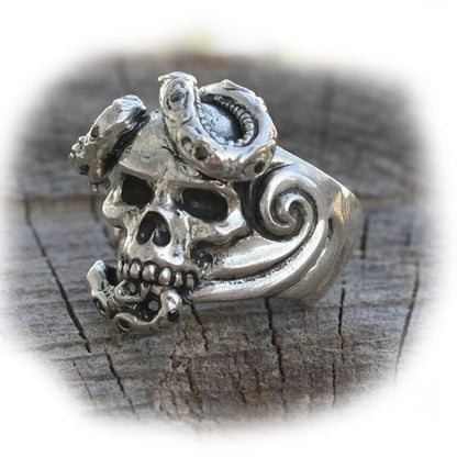 Skull Wrapped Snake Sterling Silver Ring with Onyx Stones