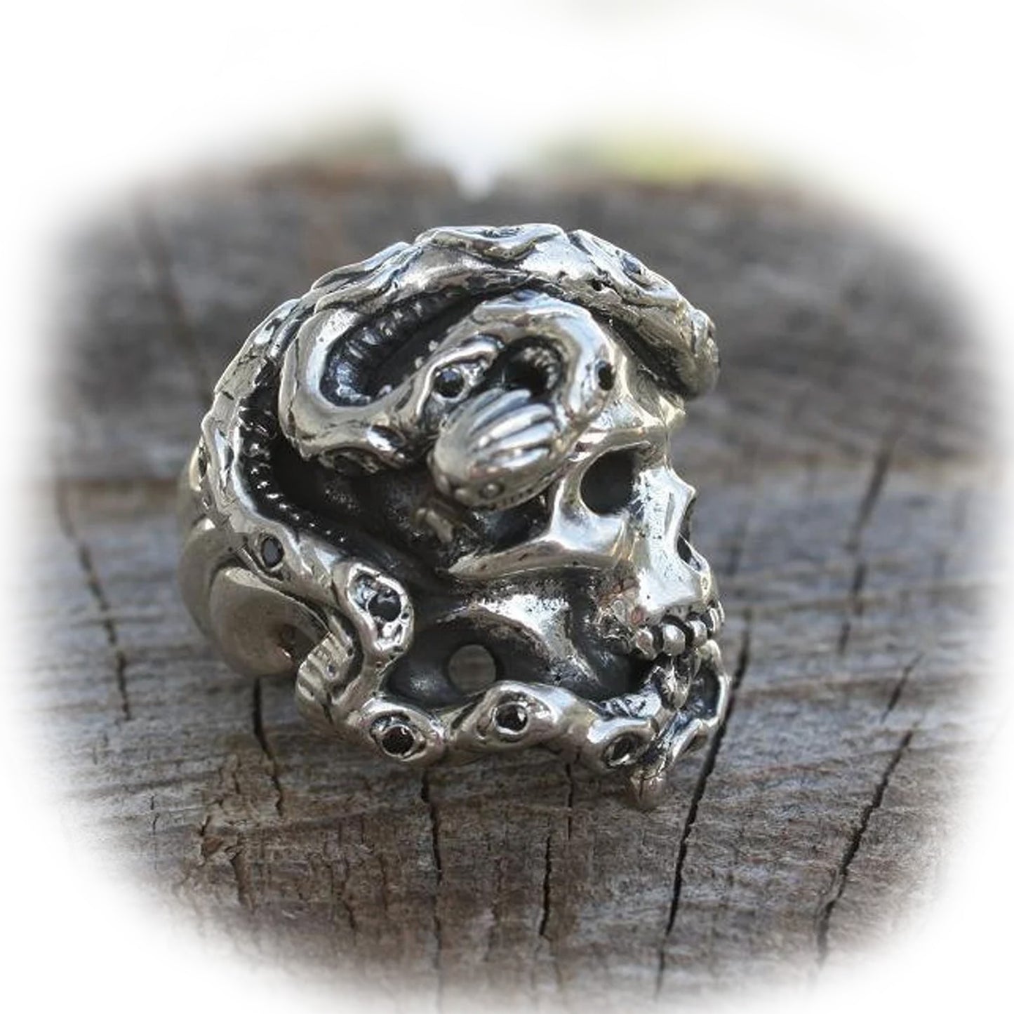 Skull Wrapped Snake Sterling Silver Ring with Onyx Stones