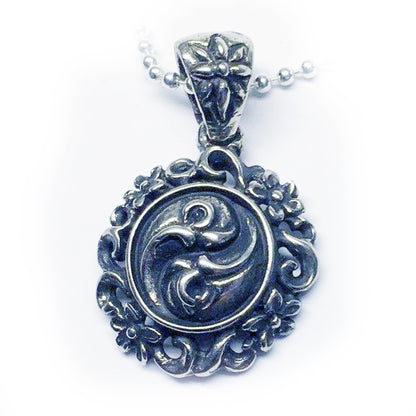 Yin-Yang Flower Sterling Silver Pendant with Ruby and Black Onyx