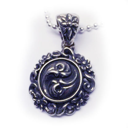 Yin-Yang Flower Sterling Silver Pendant with Ruby and Black Onyx