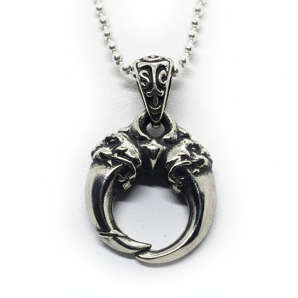 Double Lion Tooth Sterling Silver Pendant
