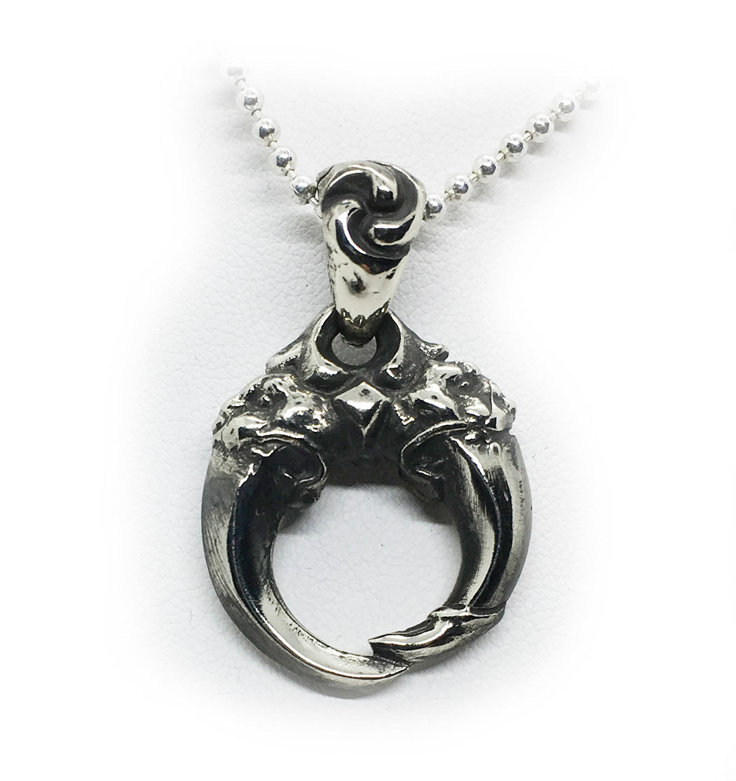 Double Lion Tooth Sterling Silver Pendant