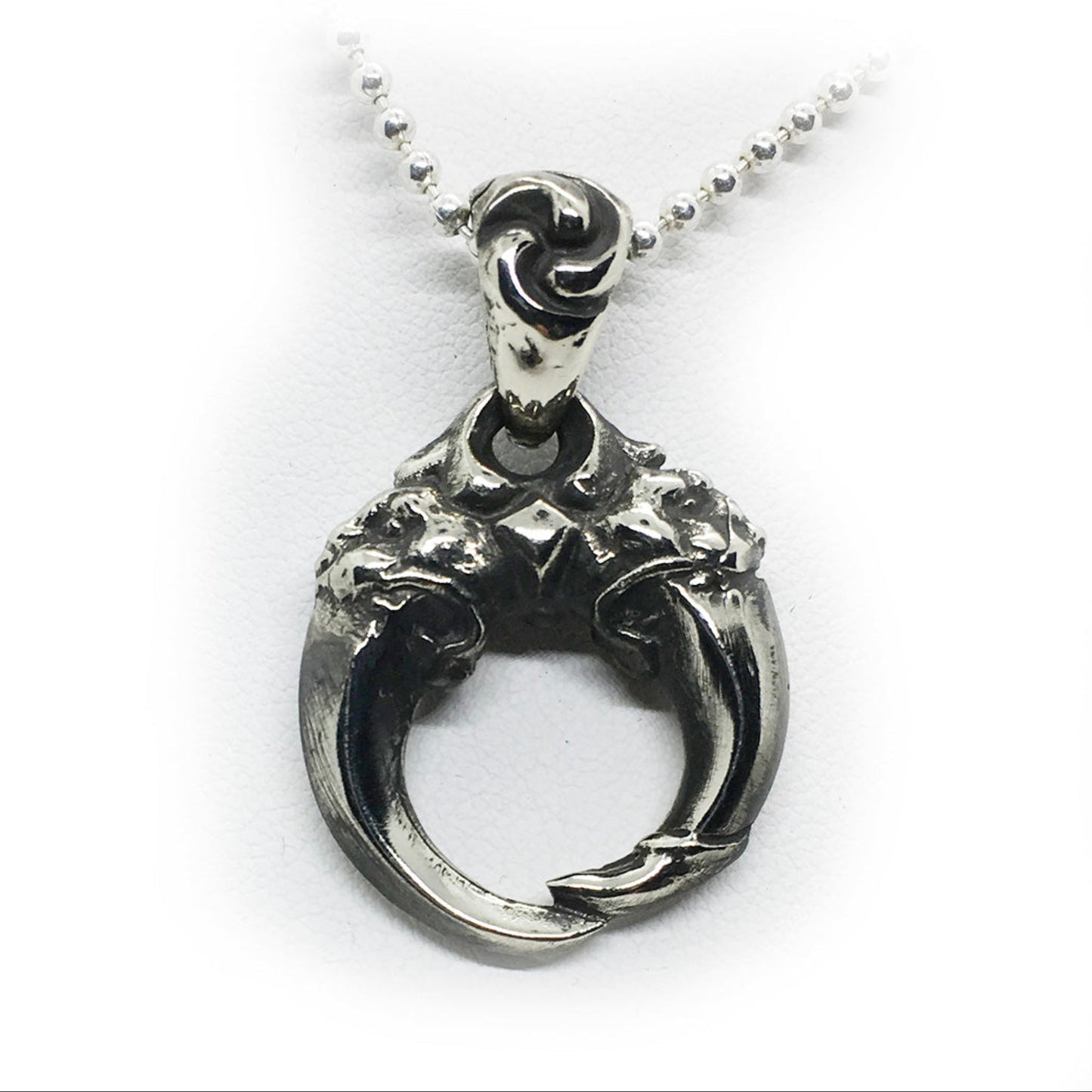 Double Lion Tooth Sterling Silver Pendant