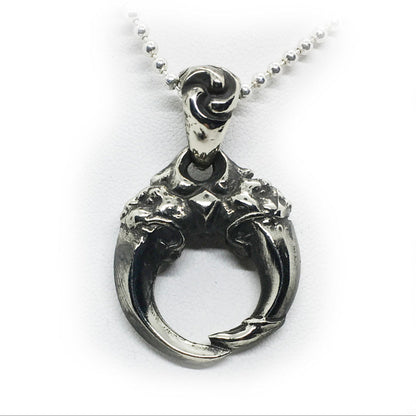 Double Lion Tooth Sterling Silver Pendant