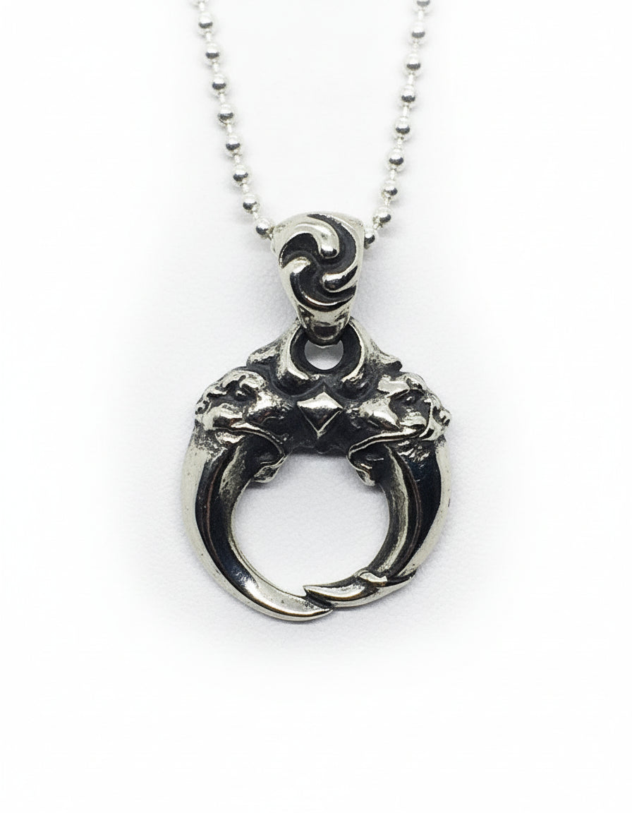 Double Lion Tooth Sterling Silver Pendant